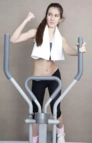 Bild: Weg mit dem Winterspeck: Mit dem Crosstrainer zur Bikinifigur