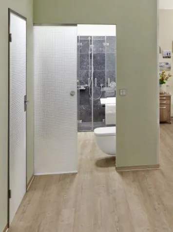 Bild: Zargenlose, lichtdurchlässige Schiebetürlösung von Wacosystems