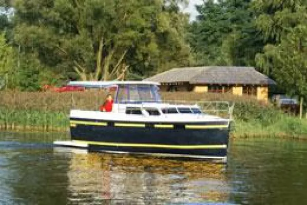 Bild: Hausboot und Rad in Masuren - eine neue Urlaubsalternative