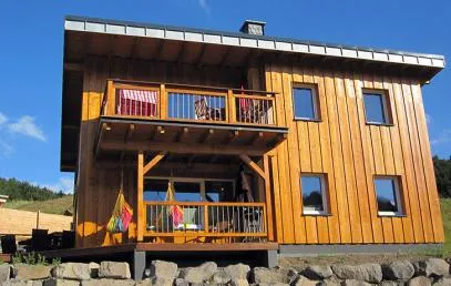 Bild: „Haus Mila“ in der vulkanischen Eifel am Riedener Waldsee – ausgezeichnet mit 5 Sternen