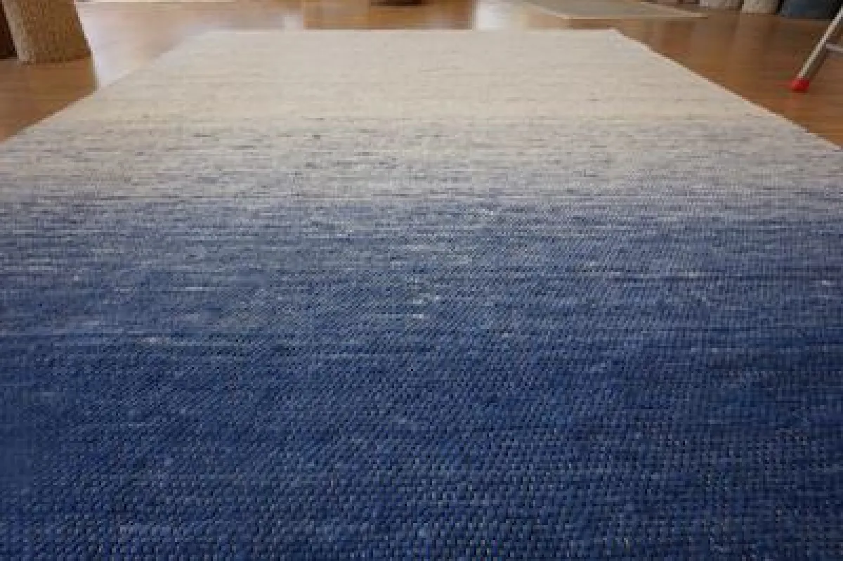 Dieser Teppich verschönert alle DENIM-Shops des Mode- Labels „Marc O’ Polo“ Foto: www.lichtteppich
