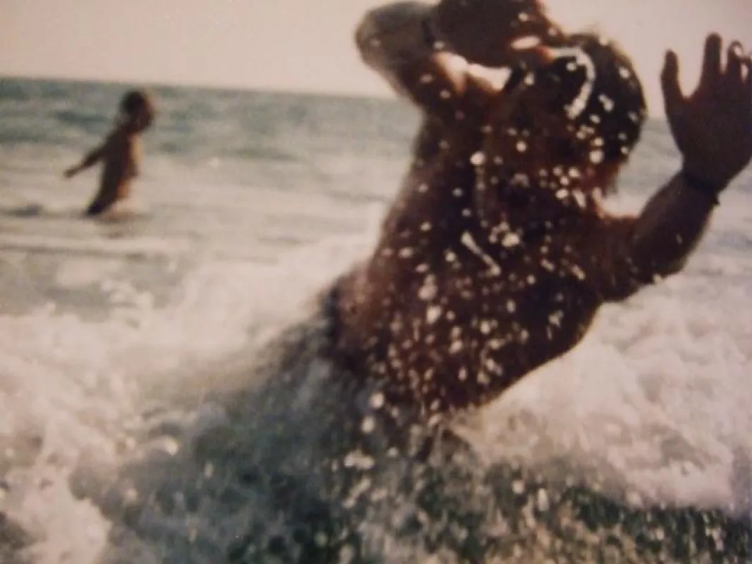 Ferienobjekte im Süden - Schwimmer am Meer