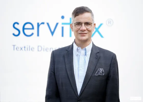 Bild: 5 Jahre Servitex: Rolf Slickers setzt den Fokus von Beginn an auf nachhaltige Textilpflege in der Hotellerie 