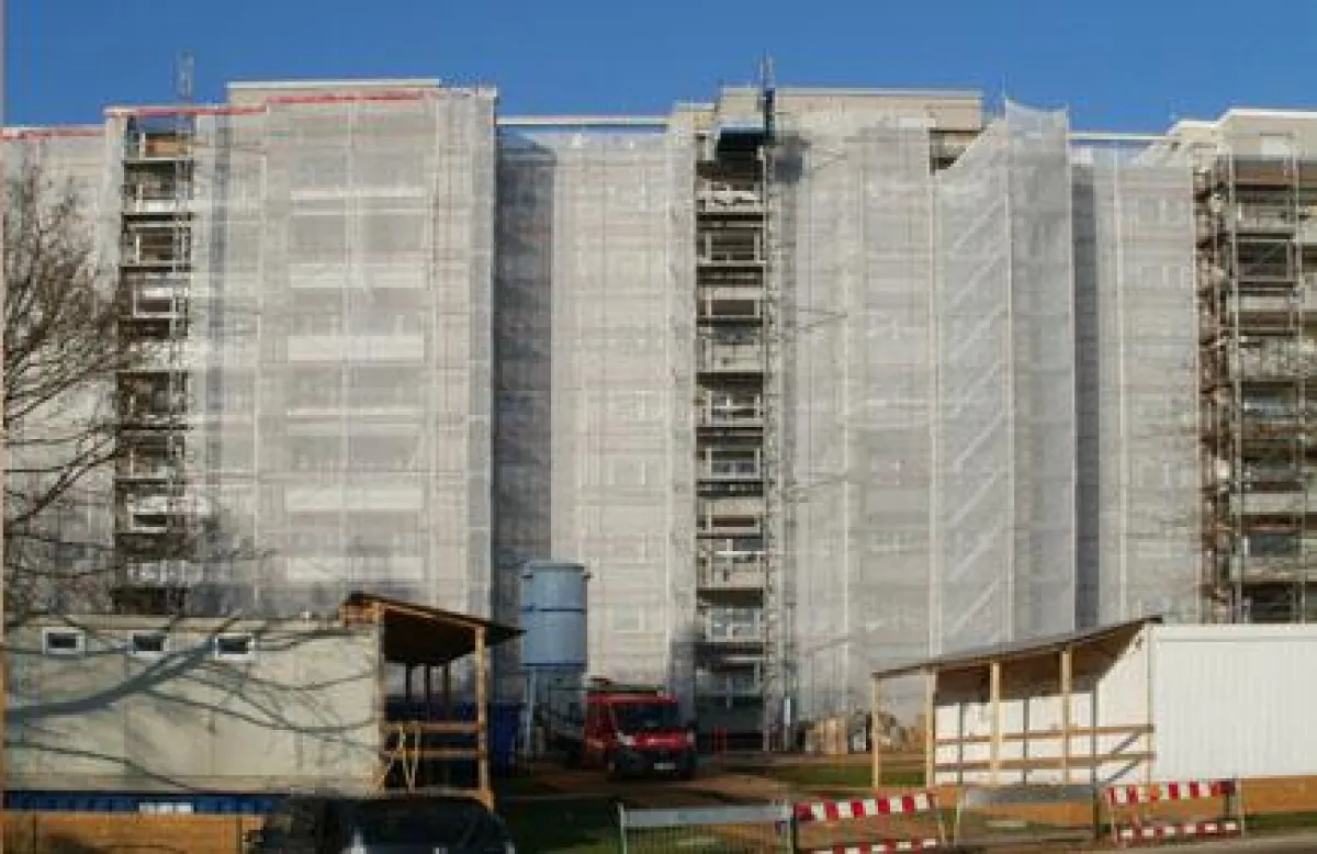 KZA Fassadensanierung eines Wohnhochhauses nach neusten energetischen Vorgaben