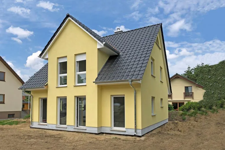 Bild: Harmonie auf einem Grundstück: Stadtvilla und Landhaus