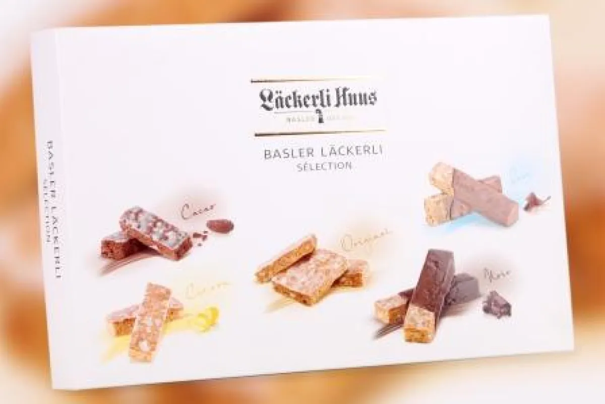 Die von der STI Group produzierten, hoch veredelten Faltschachteln für die Schweizer Premium-Süßware