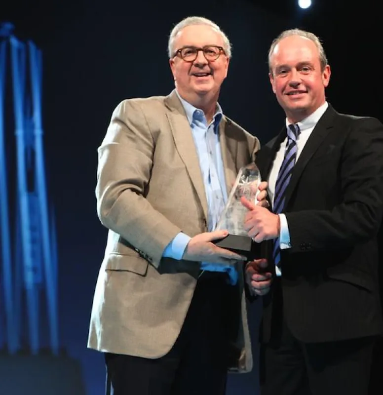 Heribert Fritz (Mitte) bei der Übergabe des IBM Beacon Awards mit Samuel J. Palmisano (links, Chairman, President and Chief Execut