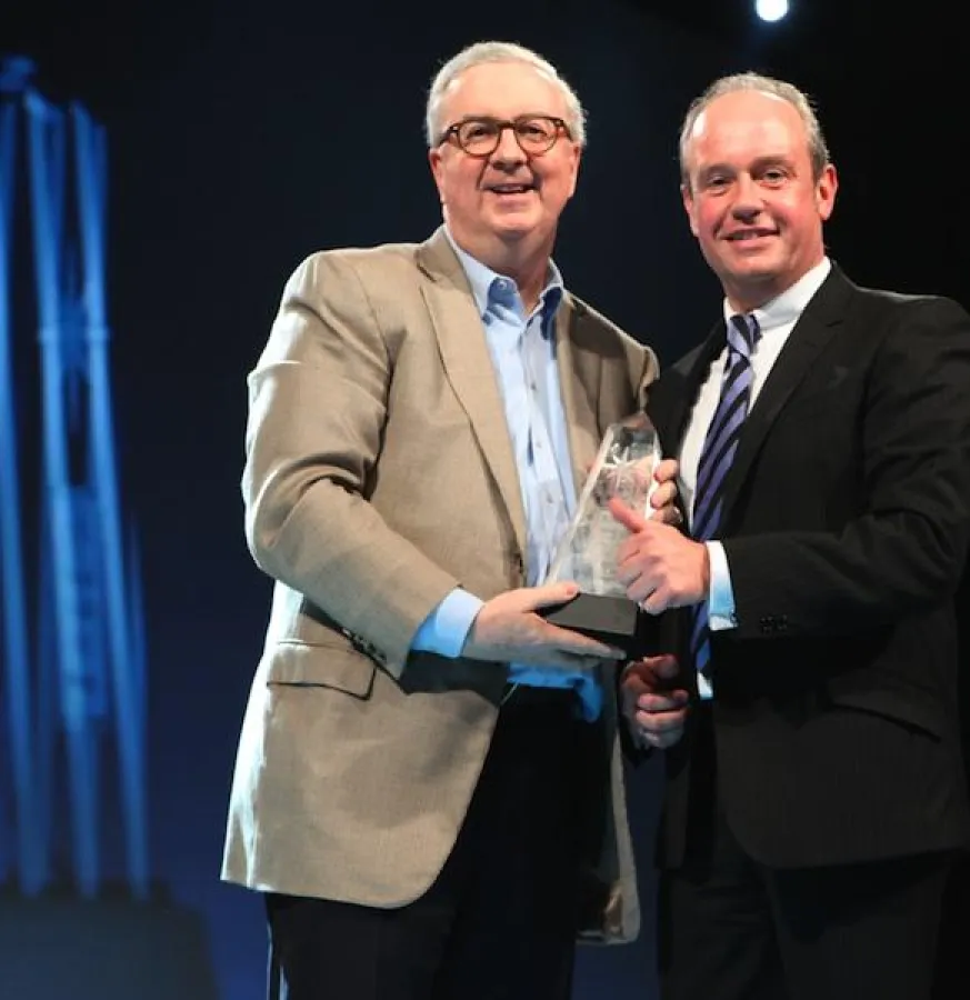 Heribert Fritz (Mitte) bei der Übergabe des IBM Beacon Awards mit Samuel J. Palmisano (links, Chairman, President and Chief Execut