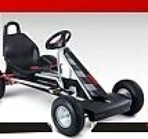 Bild: Weihnachtsgeschenk für Kinder: das Gokart unter dem Weihnachtsbaum