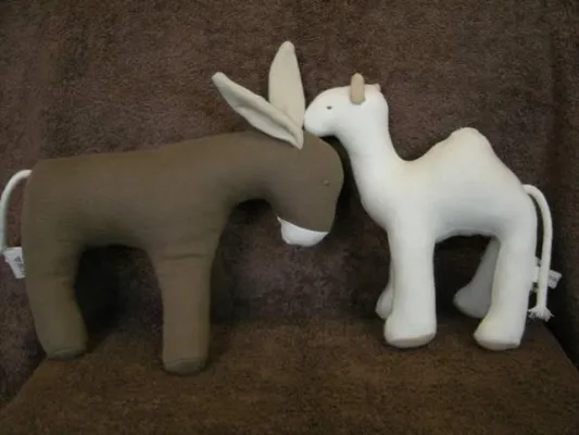 Bild: Puppen und Stofftiere sowie Handtücher aus bester Bio und Fairtrade-Baumwolle