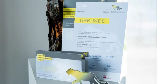 Bild: Kittelberger erhält die Auszeichnung „Sozial engagiert“