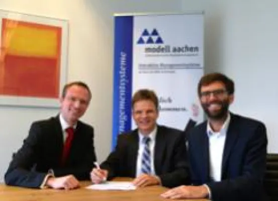 Bild: Altena-TCS GmbH und Modell Aachen GmbH beschließen Partnerschaft