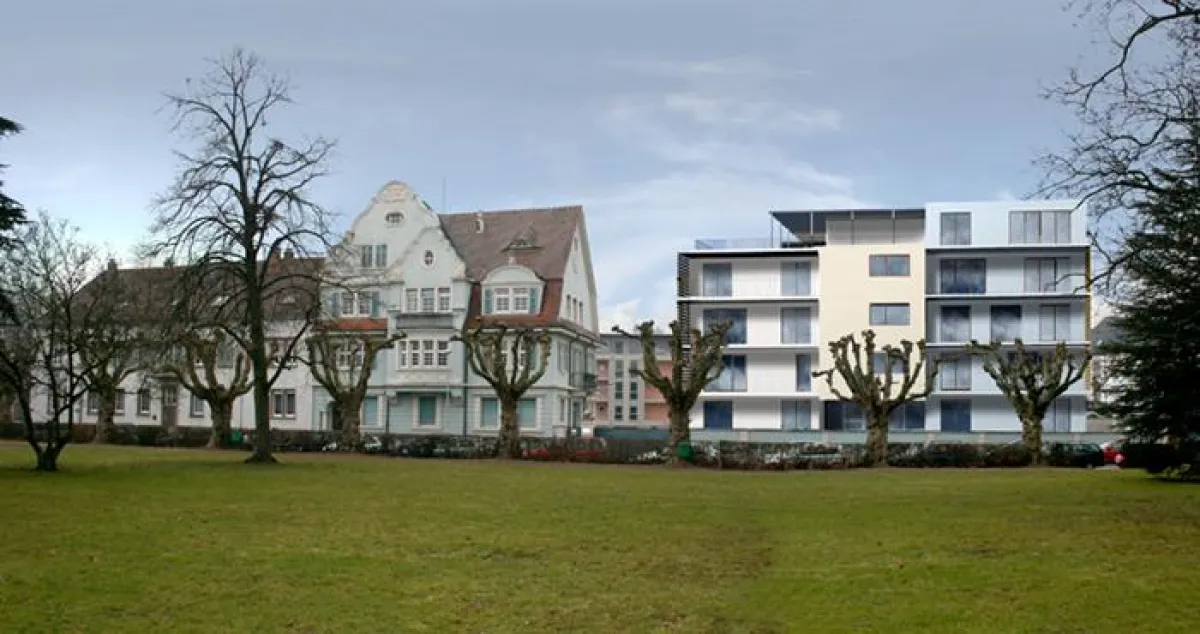 Blickt man, wie hier in der Bildmontage verdeutlicht, vom Friedrich-Ebert-Park auf den Neubau, sieht man wie gut die moderne Architektur und die alte Jugendstilvilla im neuen Quartier harmonieren.