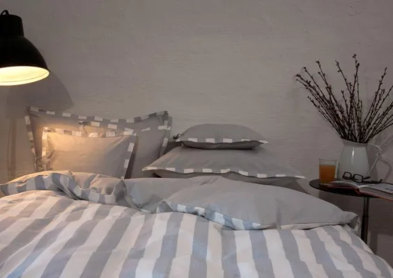 Bild: Skandinavischer Lebensstil für das Schlafzimmer – maritime Designerbettwäsche in Bioqualität von TrueStuff