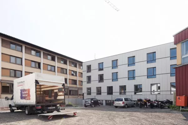 Bild: Kaplan Bonetti Haus: Neubau fertiggestellt, Sanierung Altbau beginnt im August