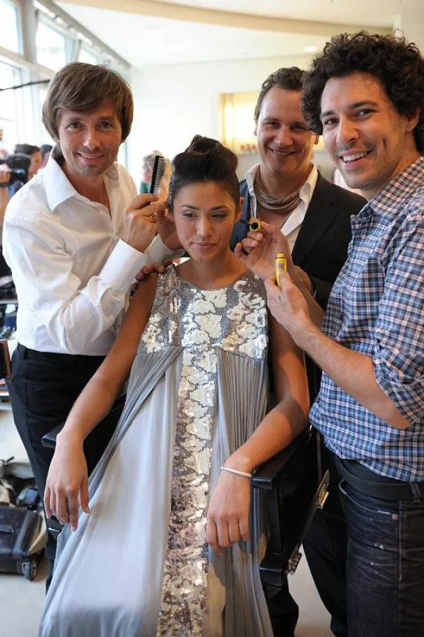 André Märtens, Guido Maria Kretschmer und Boris Entrup (v. l. n. r.) mit Model bei der Look-Probe. Foto: Michael Wittig