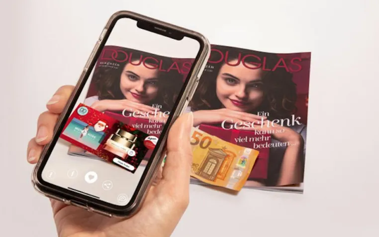 snoopstar verwandelt 50-Euro-Scheine in Augmented-Reality-Überraschungspakete für Douglas-Kunden Bild: snoopstar verwandelt 50-Euro-Scheine in Augmented-Reality-Überraschungspakete für Douglas-Kunden