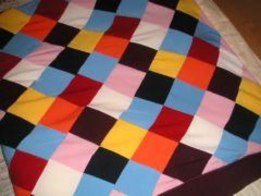 Fröhliche Patchworkdecke