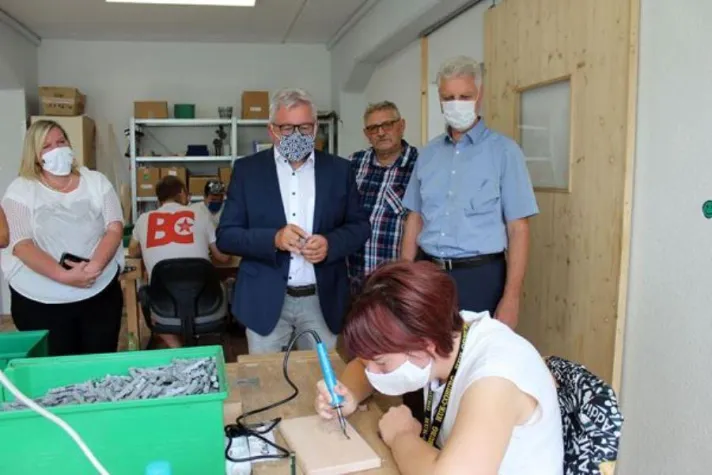 Bild: Justizminister Guido Wolf besucht Dienstleistungszentrum