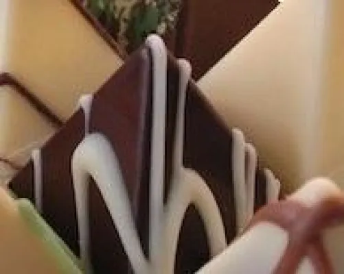 Herbsthighlight der Schrannenhalle: Neue Pralinenkreation - Likör von der grünen Walnuss in feiner Schokolade Bild: Herbsthighlight der Schrannenhalle: Neue Pralinenkreation - Likör von der grünen Walnuss in feiner Schokolade