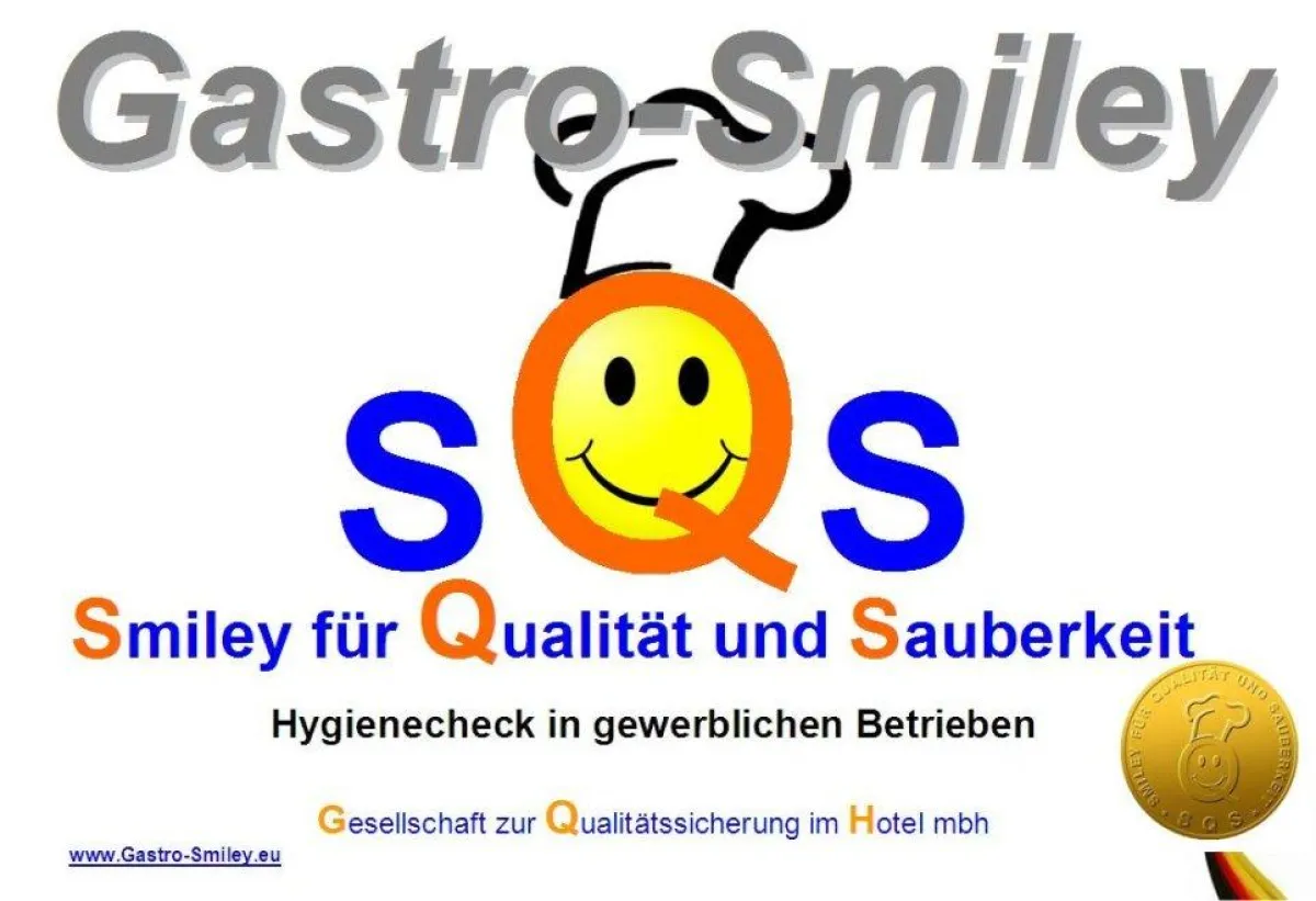 Gastro-Smiley für COLUMBIA Hotel Rüsselsheim. Copyright: Gesellschaft für Qualitätssicherung im Hotel mbH.