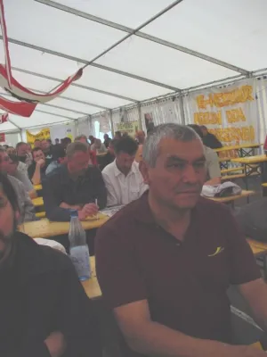 Bild: Gewerkschafter aus Venezuela besuchte Streikende bei CNH/O&K in Berlin