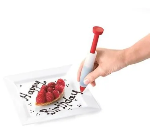 Bild: Mit dem CUISIPRO Dekorationsstift wird das Weihnachtsgebäck noch schöner