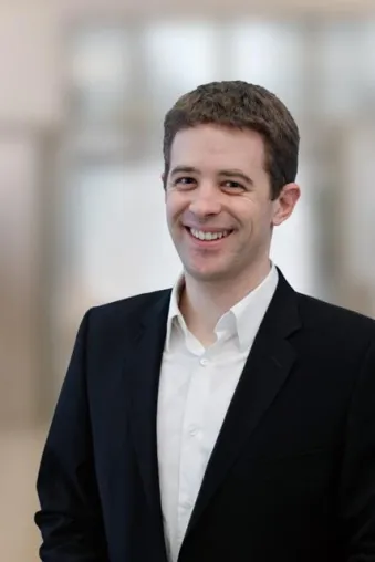 Bild: Tim Augustin leitet Business Development bei Exelution