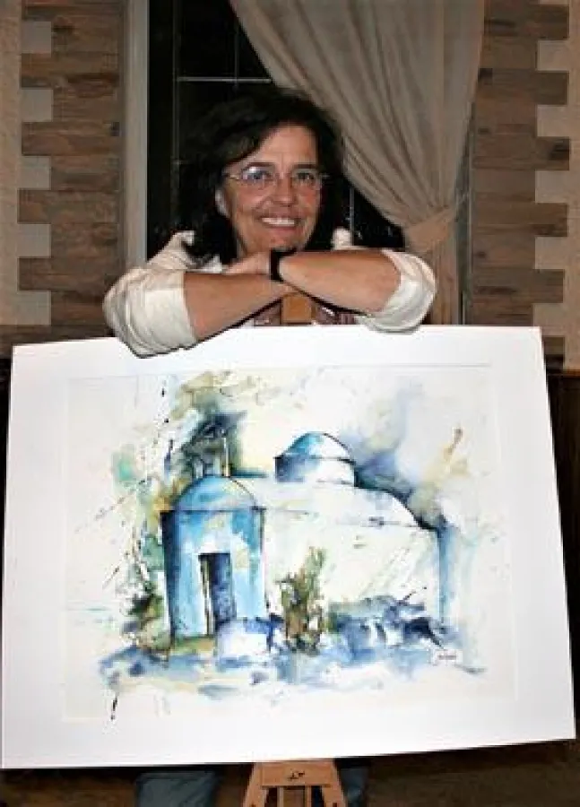 Ursula Jankowski stellt ihre Motive von Patmos im Essener Restaurant Nefeli aus. Foto: Peter Dettmer
