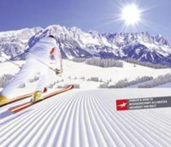 Bild: Sonnenskifahren bei atemberaubendem Panorama und bestens präparierten Pisten