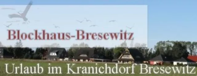 Bild: Romantisches Blockbohlenhaus im Kranichdorf Bresewitz