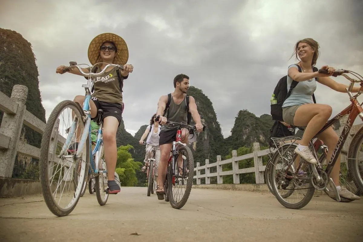 Eine Radtour durch die Reisfelder Chinas zählt zu den einmaligen Erlebnissen.