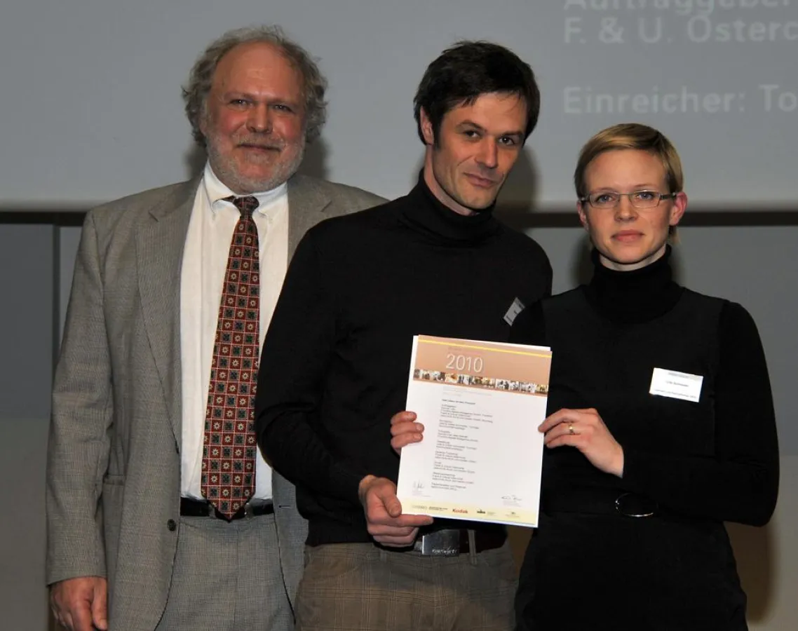 Roland Bertsch vom grafischen Klub Stuttgart sowie Volker und Julia Schmiedel von Tocologo