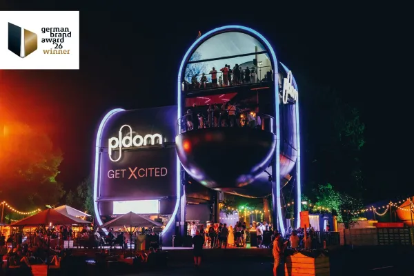 Bild: German Brand Award 2026: Erneuter Gewinn für das innovative Festivalmodul „Ploom Planet“