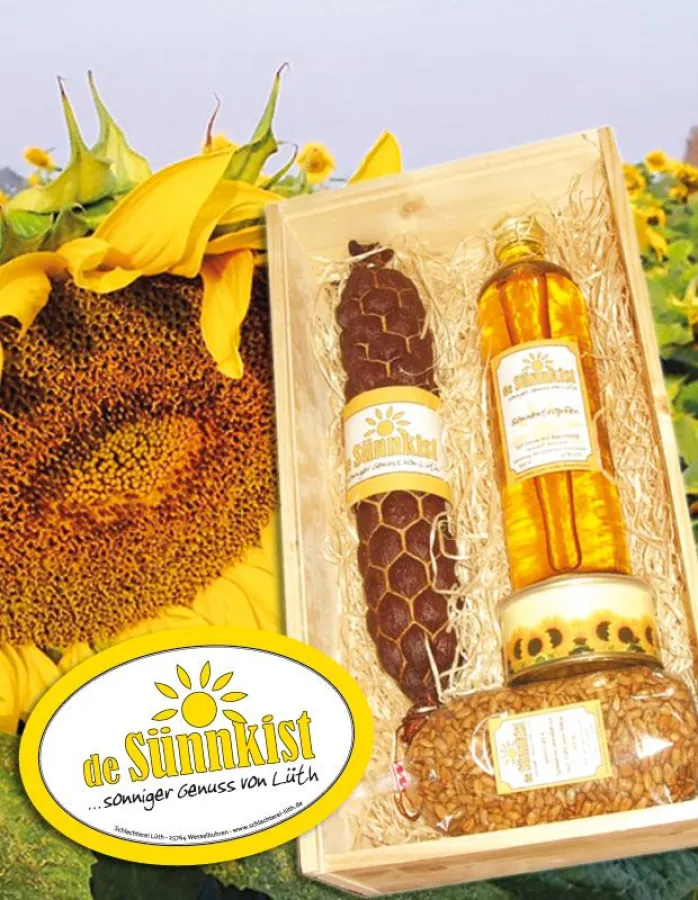 Logo und Geschenkkiste von „de Sünnkist“