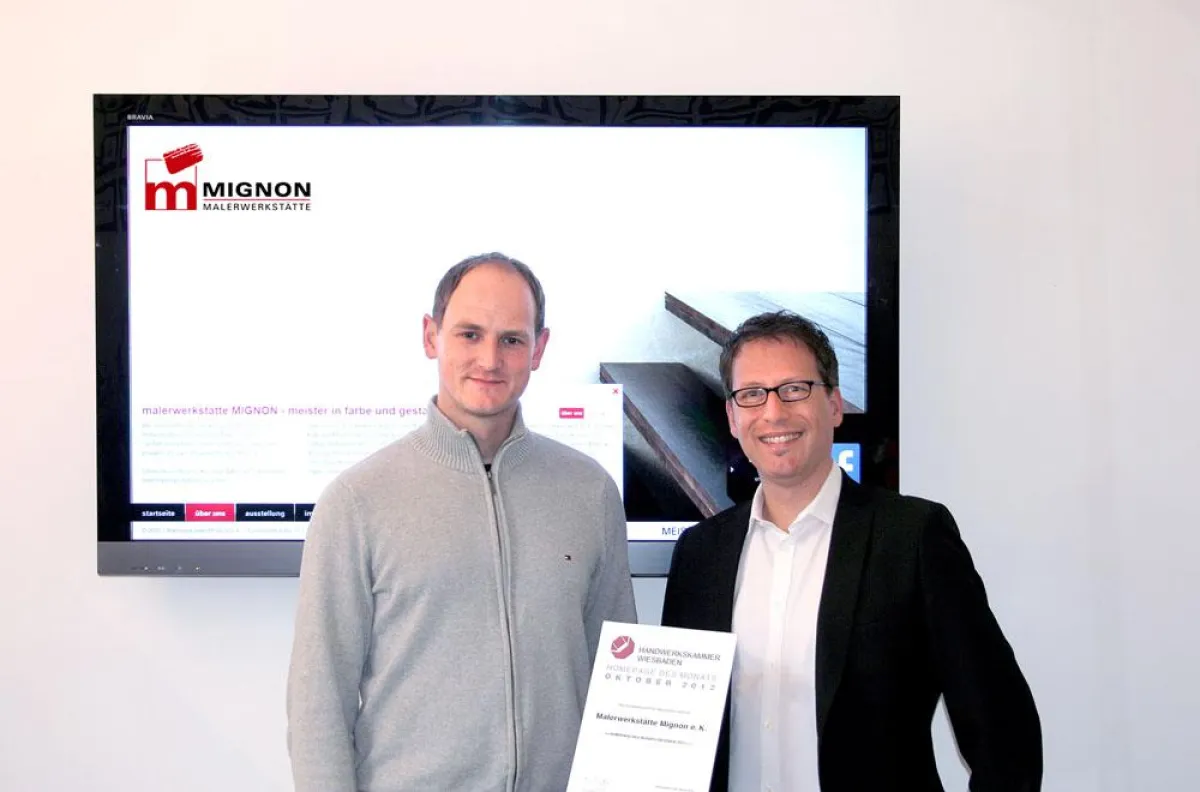 Stephan Kernbach (MIGNON) und Uli Rinker (Grips Design) mit der Auszeichnung