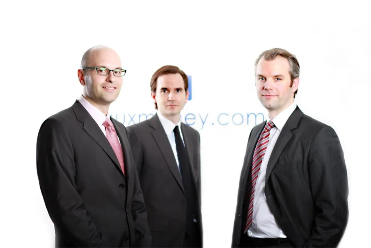 Die Gründer von auxmoney: Johnen, Kamp, Kriependorf