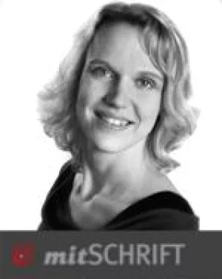 Bild: Schriftdolmetscher und Gebärdensprachdolmetscher Hand in Hand